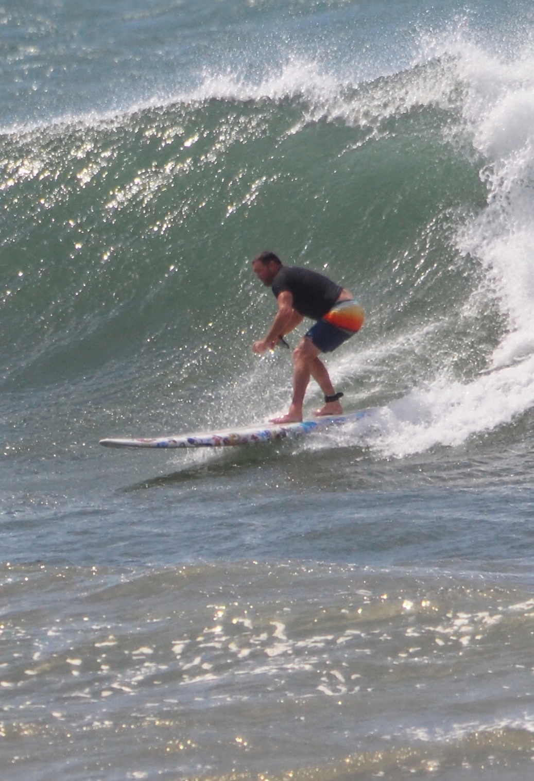 Brendon surfing a breaking wave