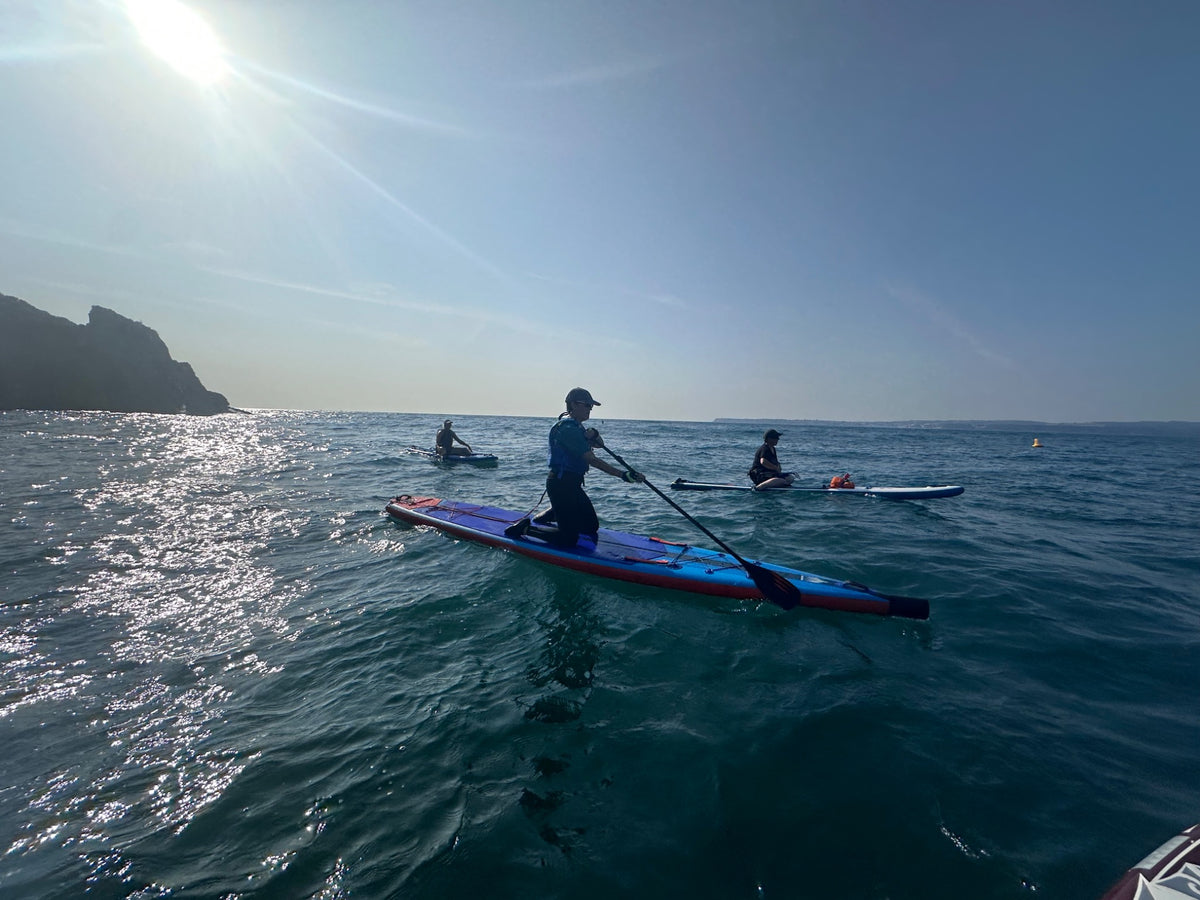 Paddlers enjoying a coastal SUP session