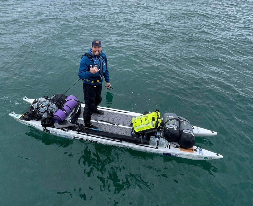 Brendon Prince with a fully loaded expedition paddleboard